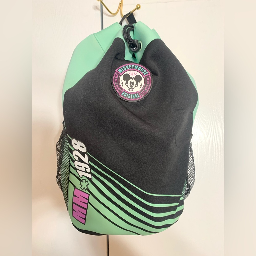 NWT. Disney swim bag. cinch-top neoprene green and black swim backpack